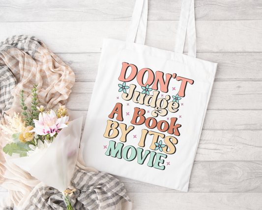 Don't Judge a Book By Its Movie Sublimated Tote Bag